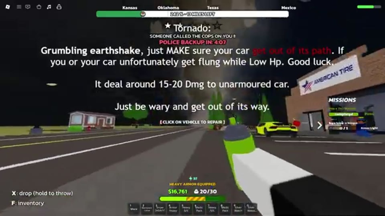 Tornado near American Tire storefront — keep vehicle out of path